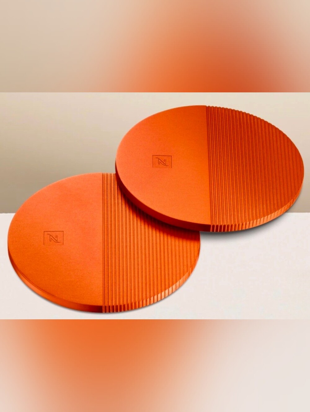 NWOT Nespresso Orange Recycled Aluminum Coasters - Set of 2 - Limited Edition